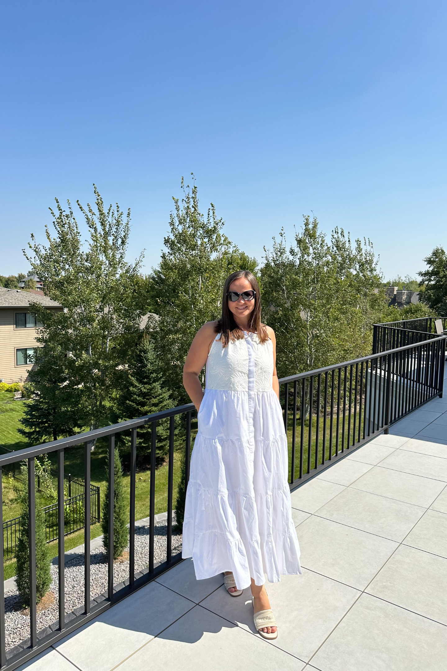 Sleeveless embroidered tiered maxi dress